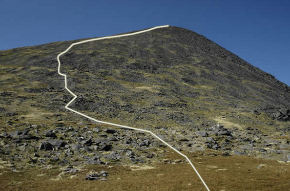 The long drawn out summit slope of Carrauntoohil as seen from the top of the Devil's Ladder. The path sub-divides many times here but all variations lead eventually to the summit.